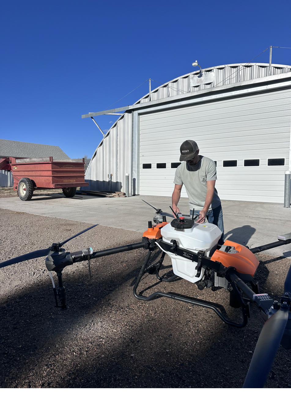 Loading the Vector HD580 spray drone