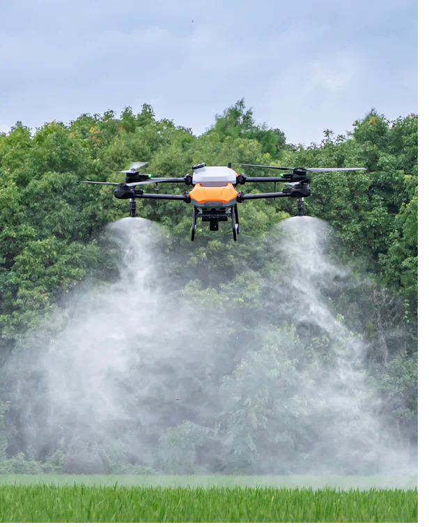 Spray drone over field